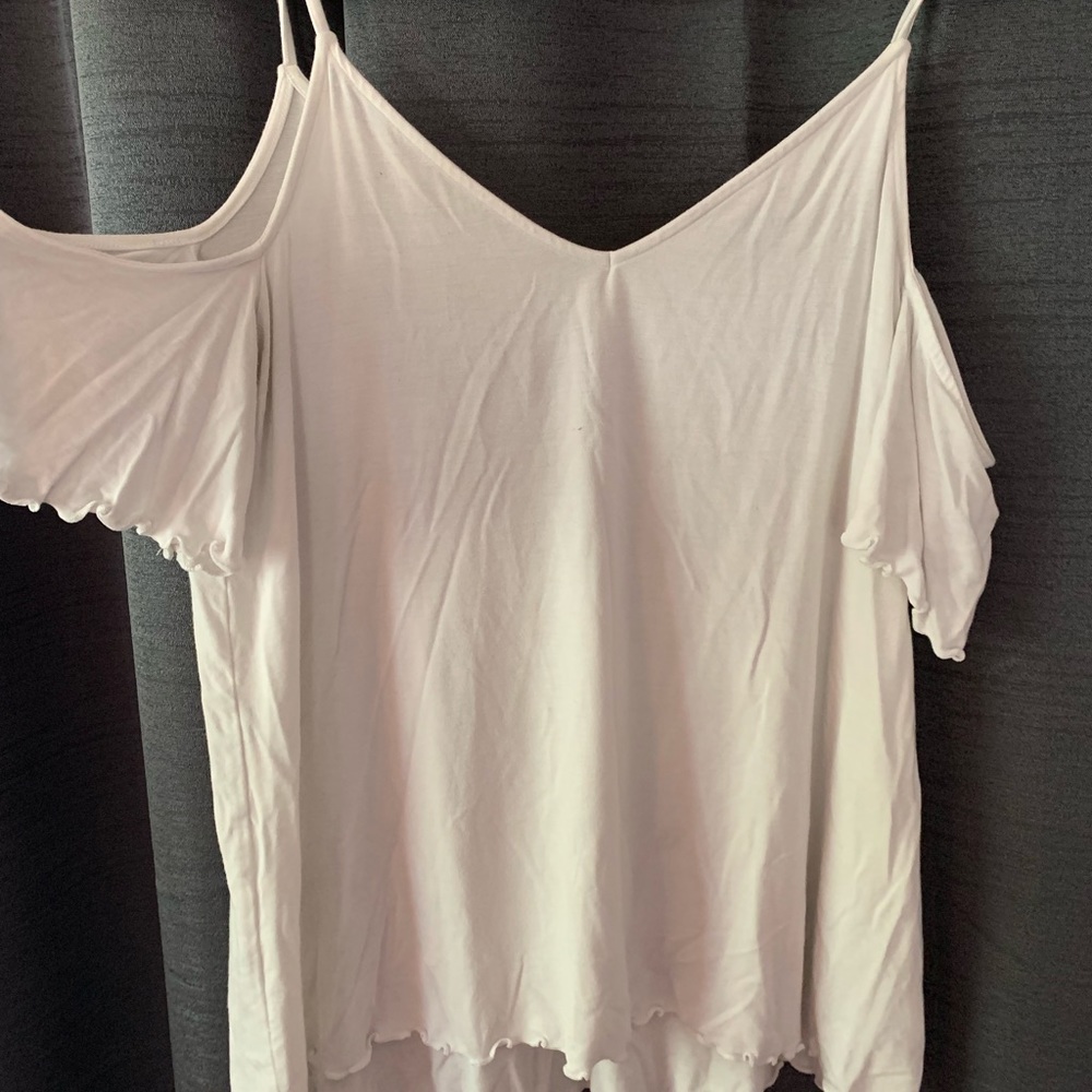 White short sleeves shirt with cut of shoulders